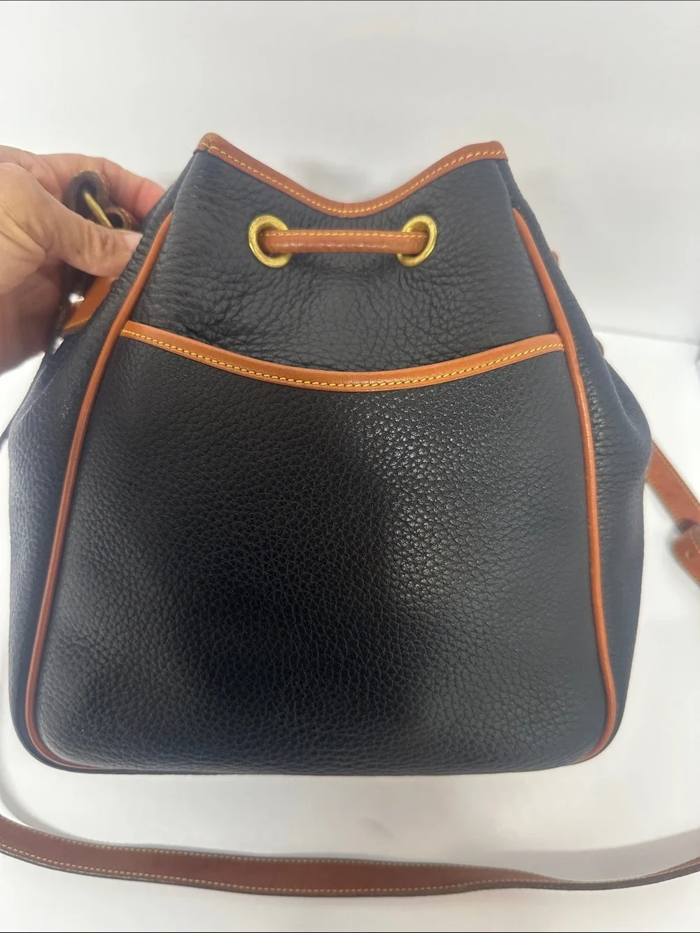 Dooney & Bourke Black Pebbled Leather Drawstring Bucket Bag with Tan Trim